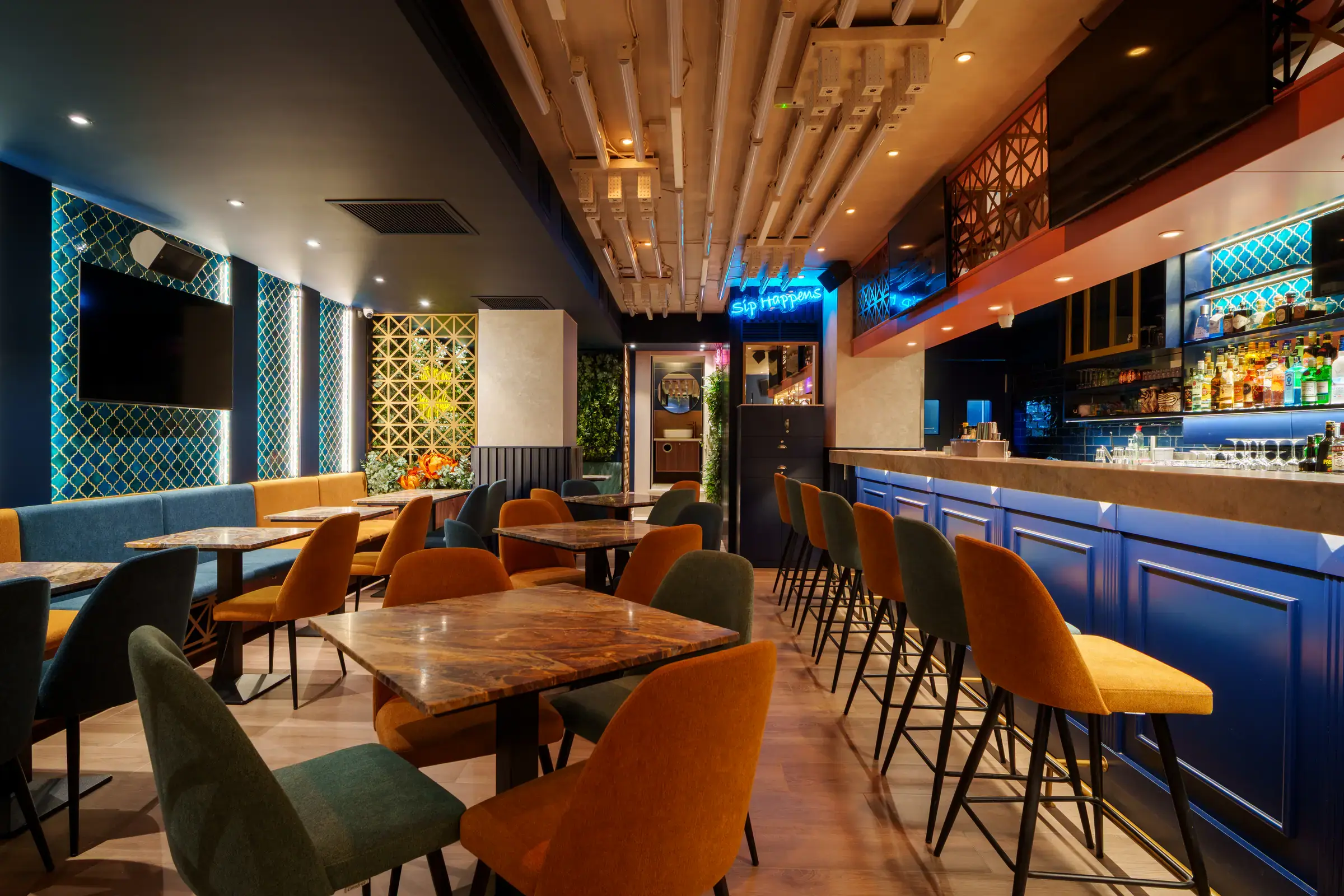 The long dining room and bar at Ritz Gastropub in Victoria, Gozo